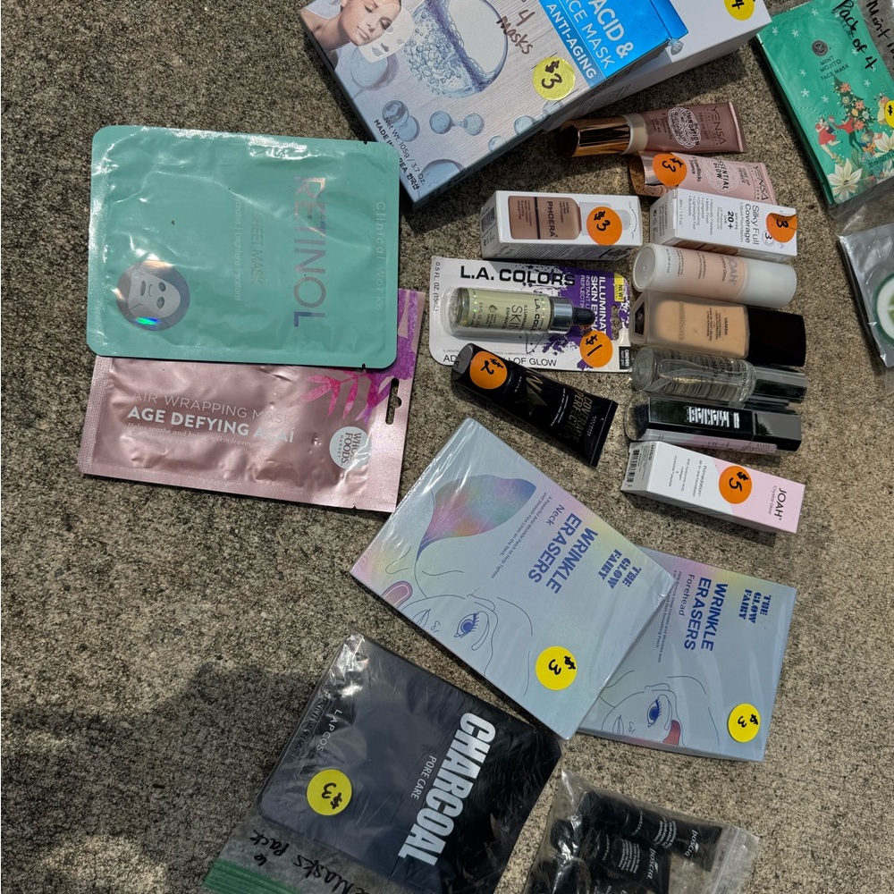 Assorted makeup and face mask beauty items — light neutral shades
